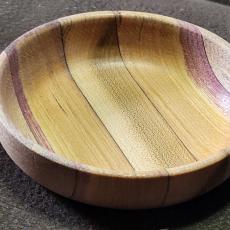 Striped bowl with purple accents